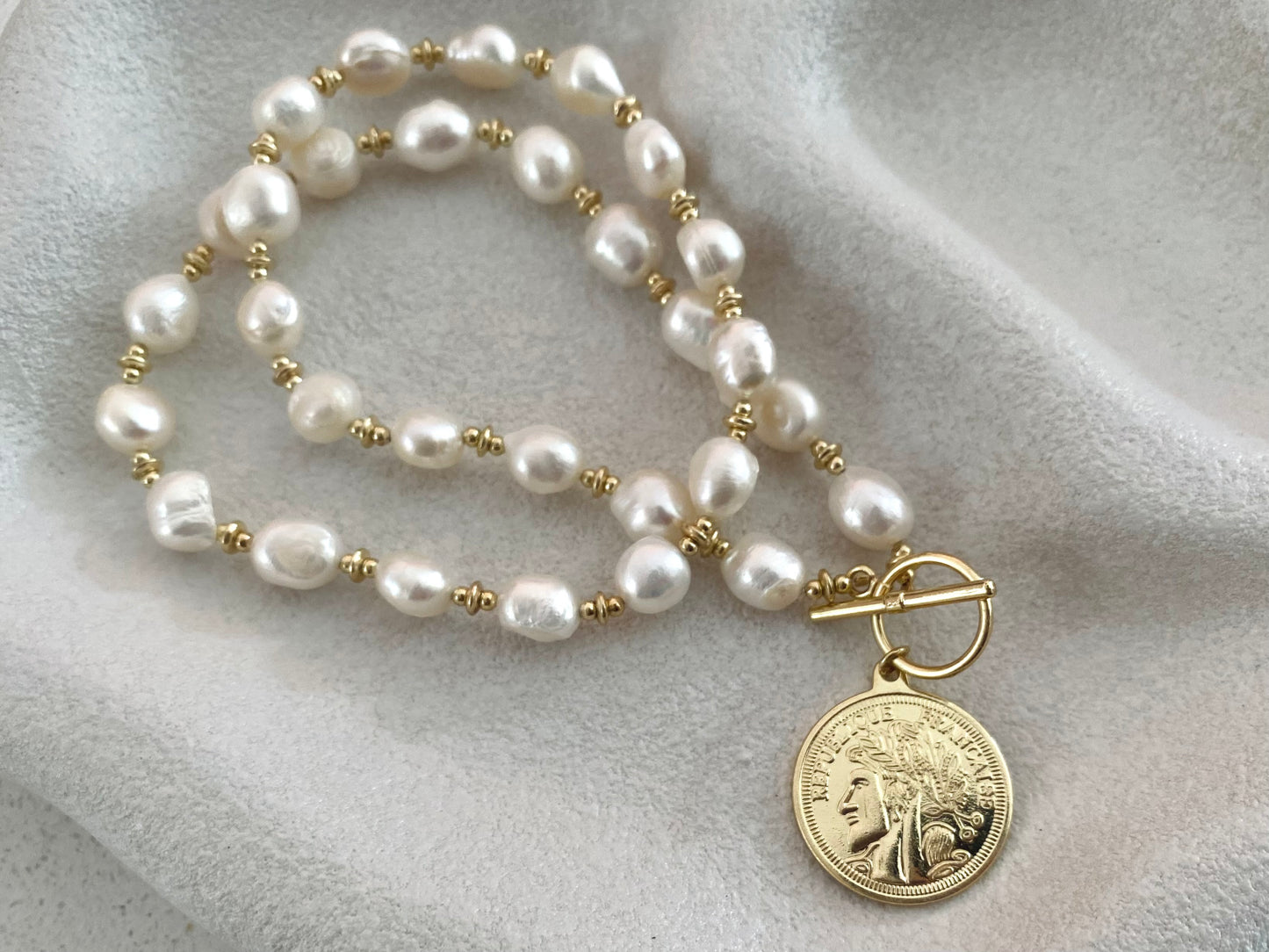 Token Whisper Pearl Necklace