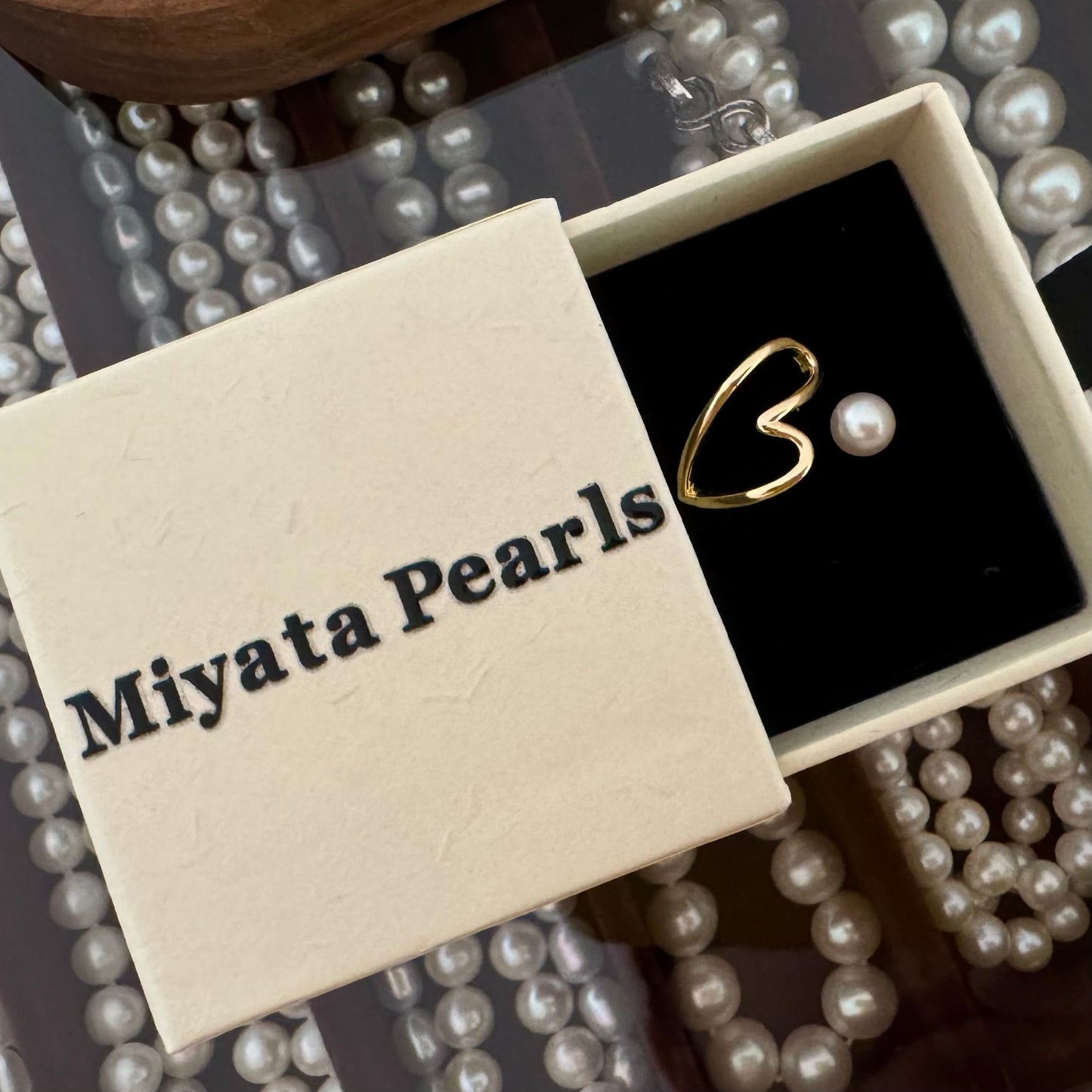 Pearl with heart ring
