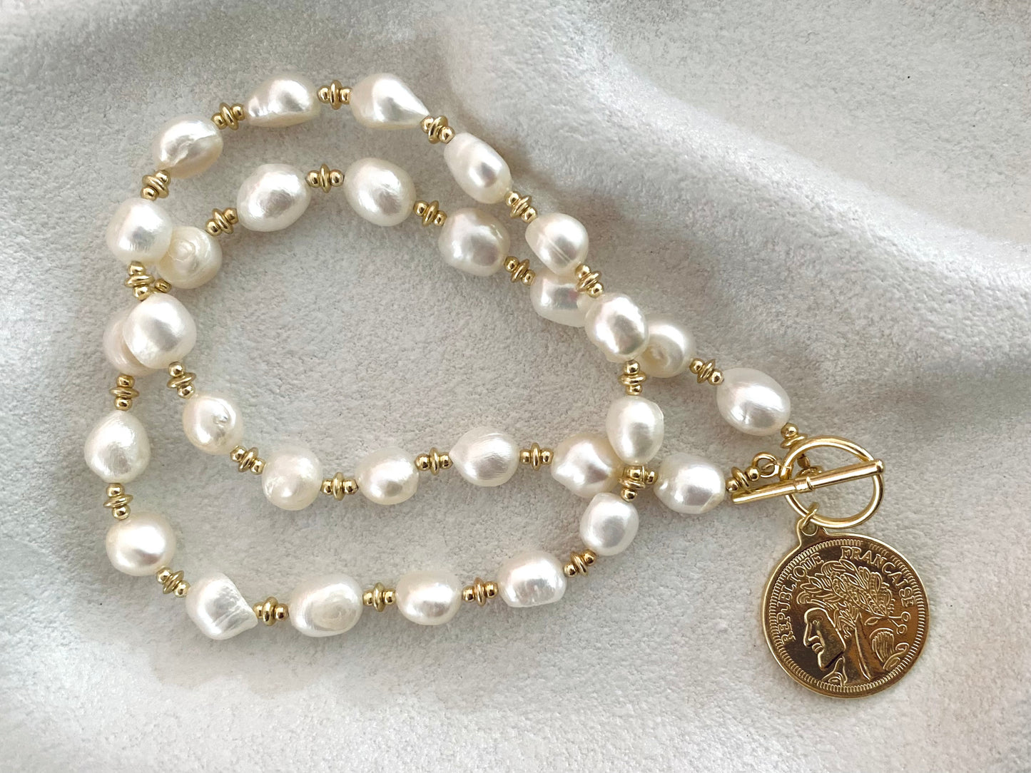 Token Whisper Pearl Necklace