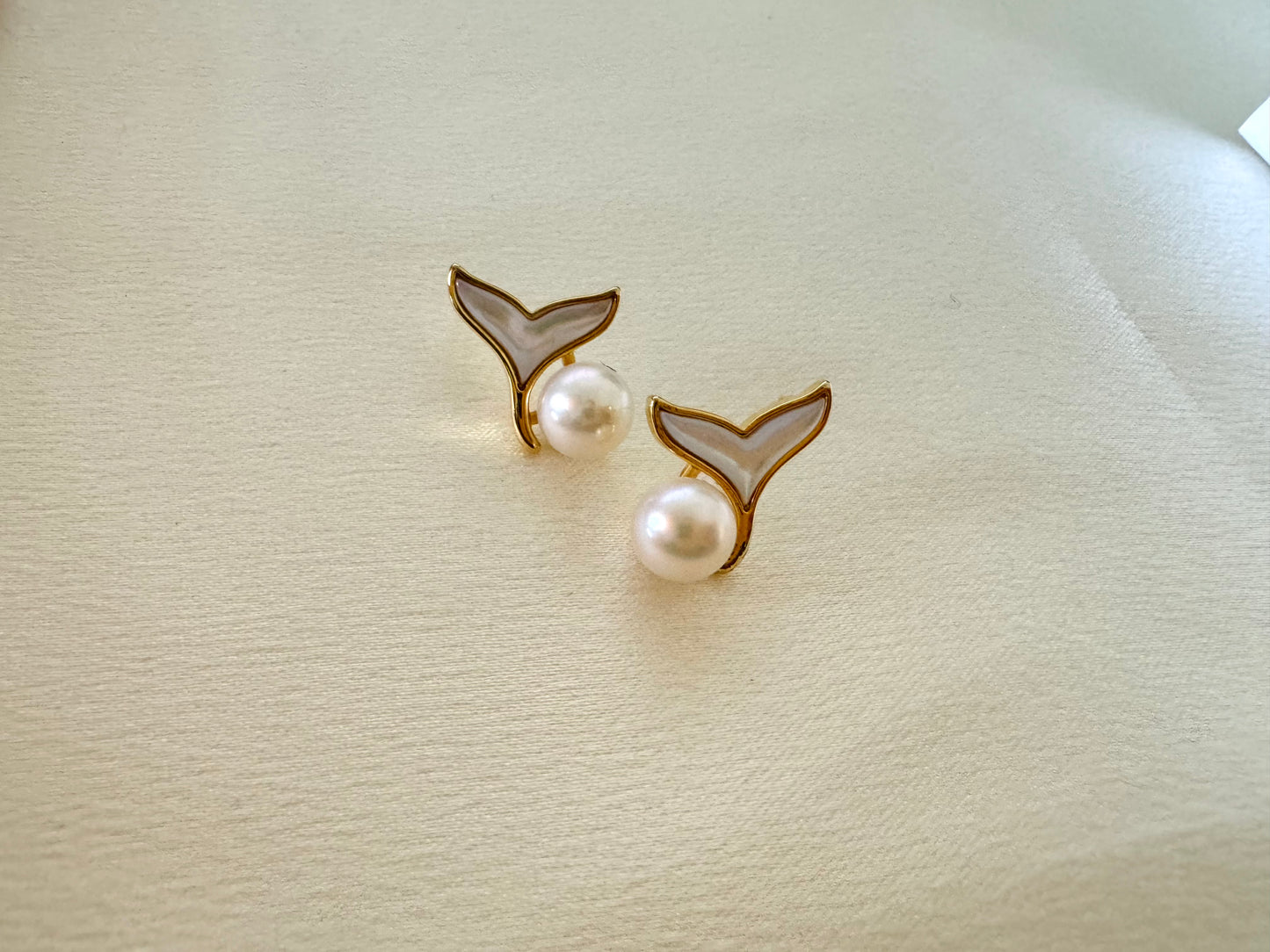 Dolphins tails drop earrings
