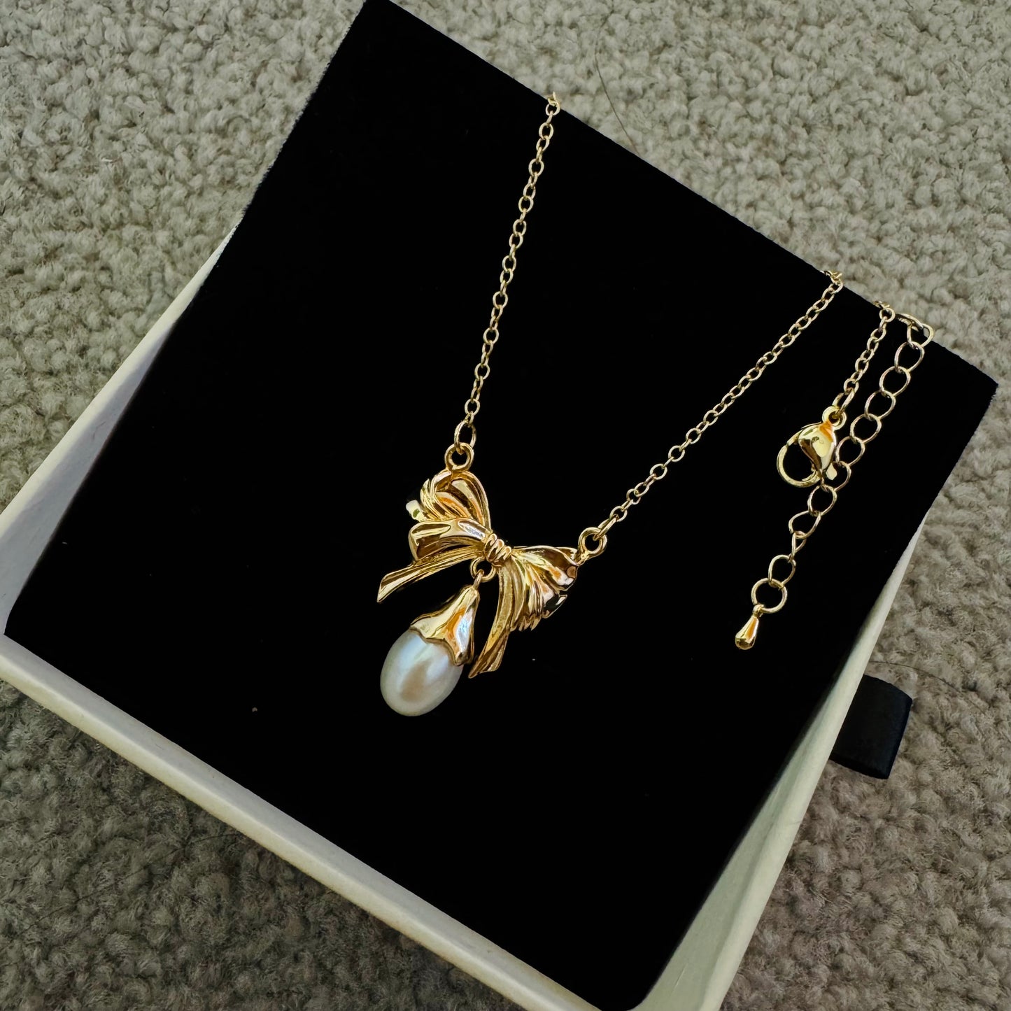 Knot bow pearl pendant necklace