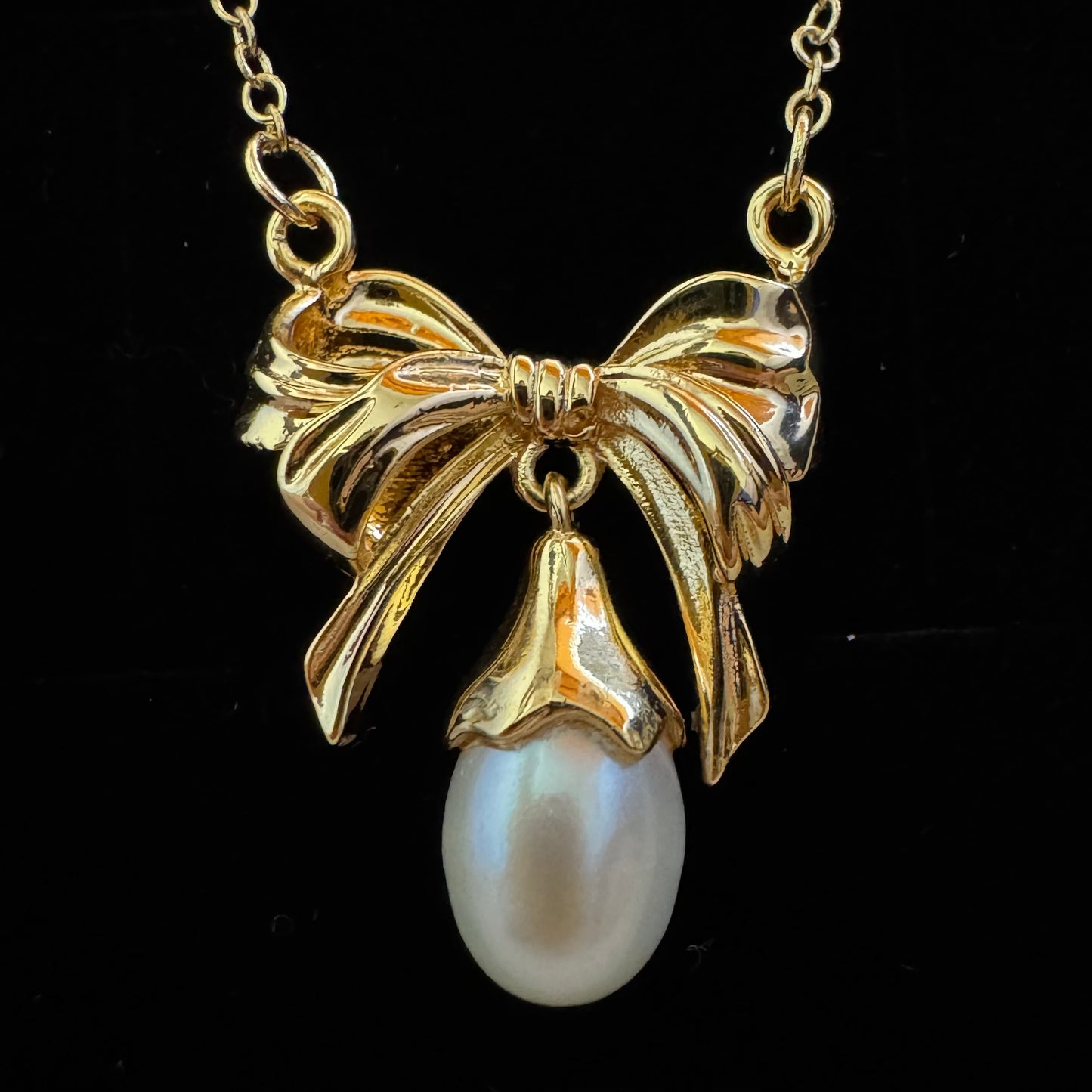 Knot bow pearl pendant necklace