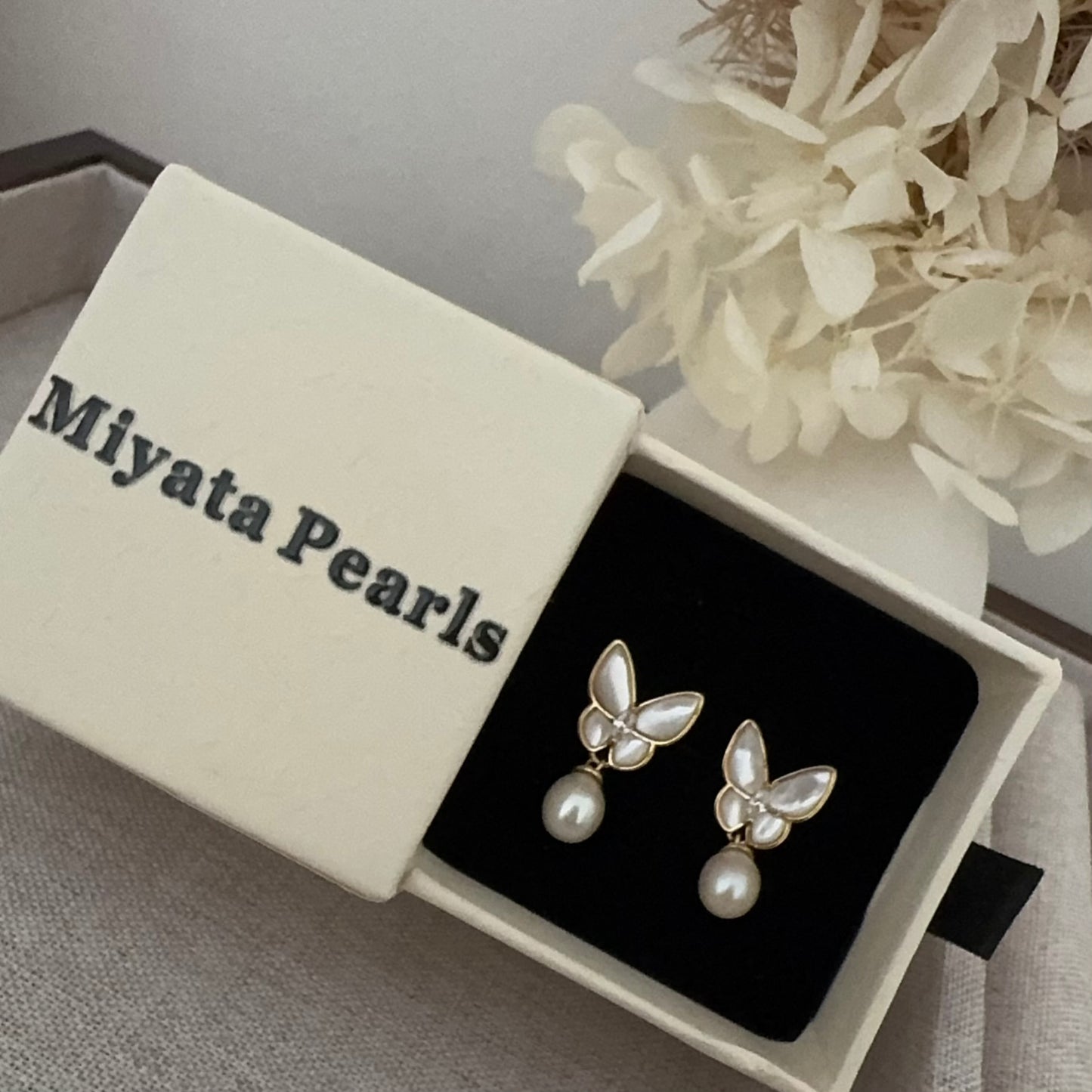 Butterfly Grace Pearl drop earrings
