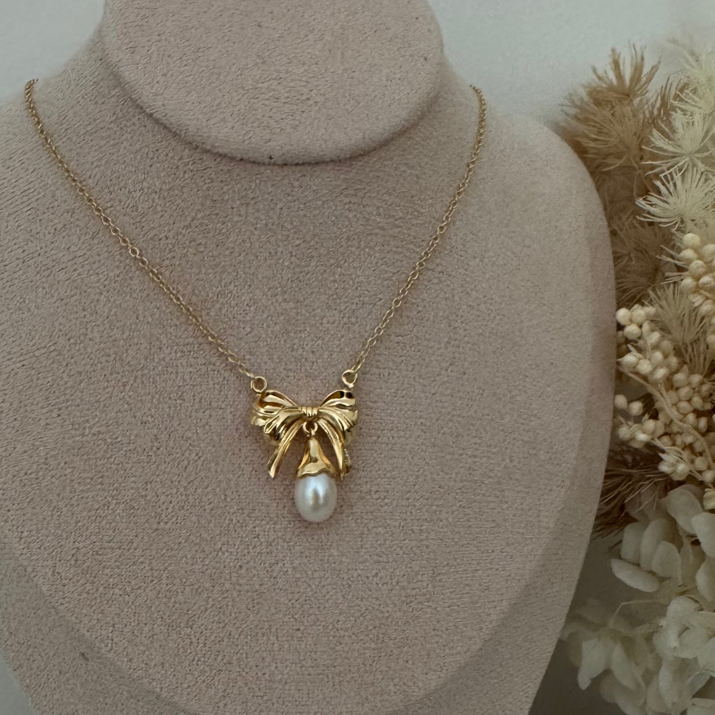 Knot bow pearl pendant necklace