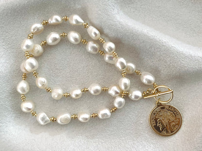 Token Whisper Pearl Necklace