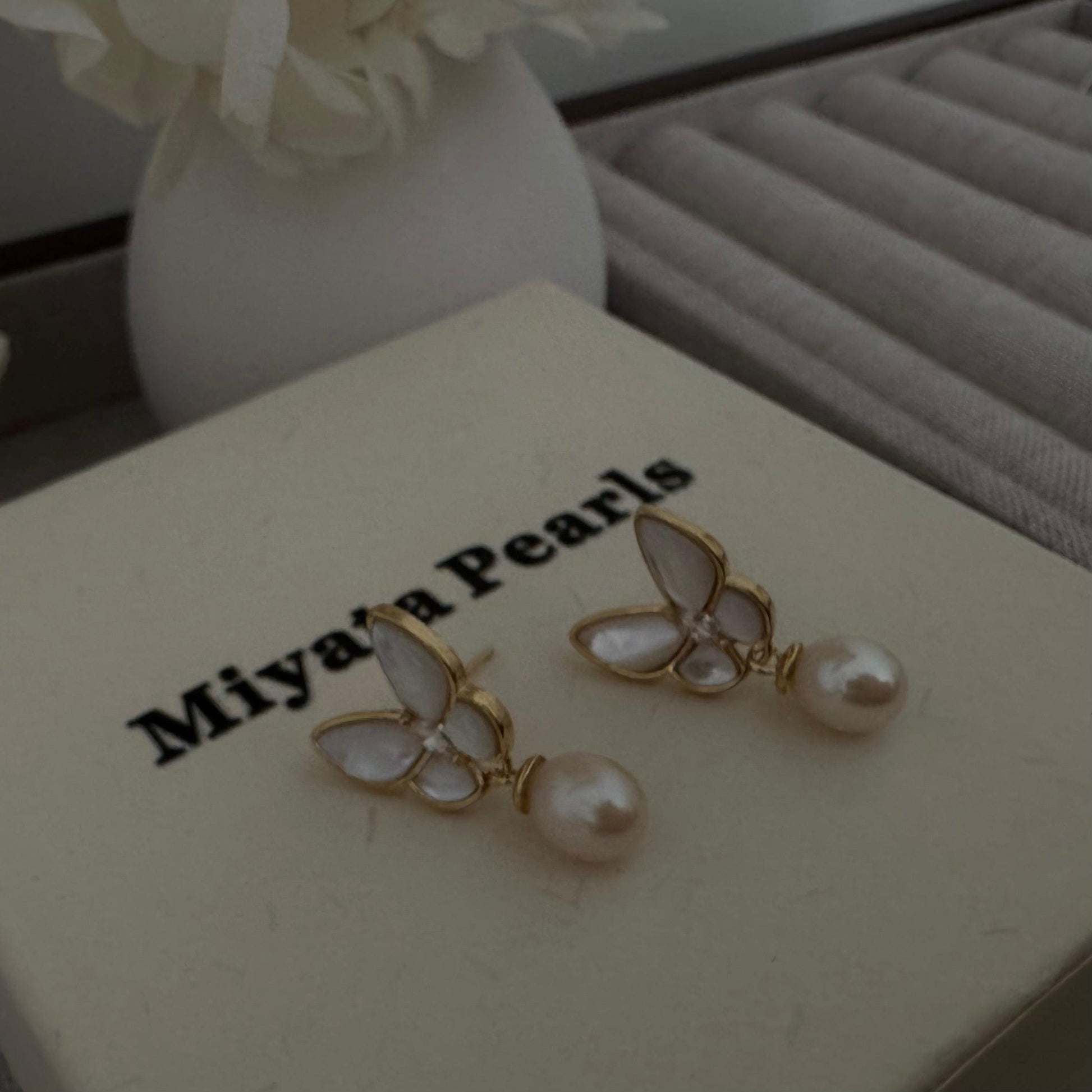 Butterfly Grace Pearl drop earrings