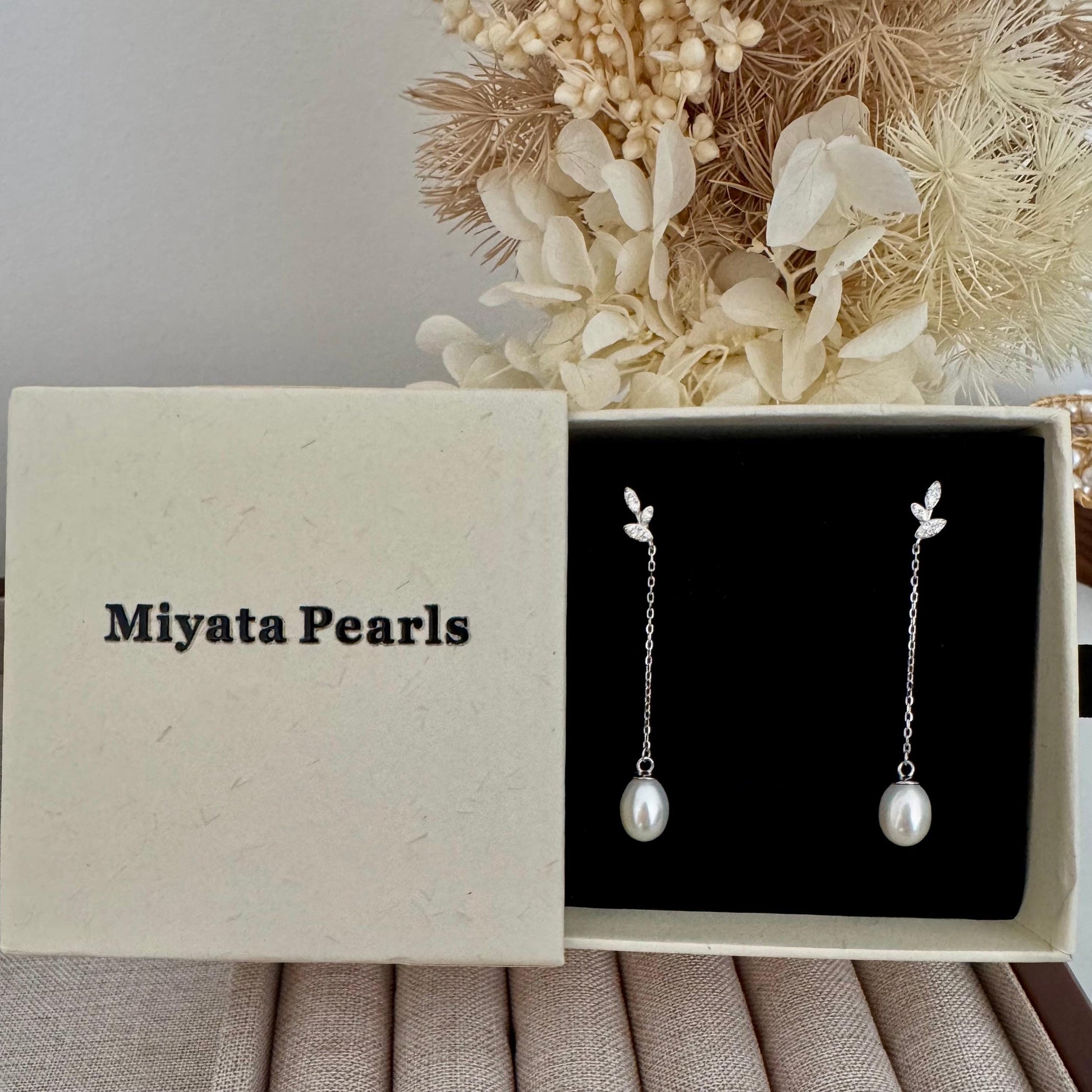 Dainty pearl drop earrings